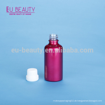 50ml rosa Farbe Beschichtung Glasflasche mit Tamper evident Schraubverschluss und Blende Reduzierer enthalten